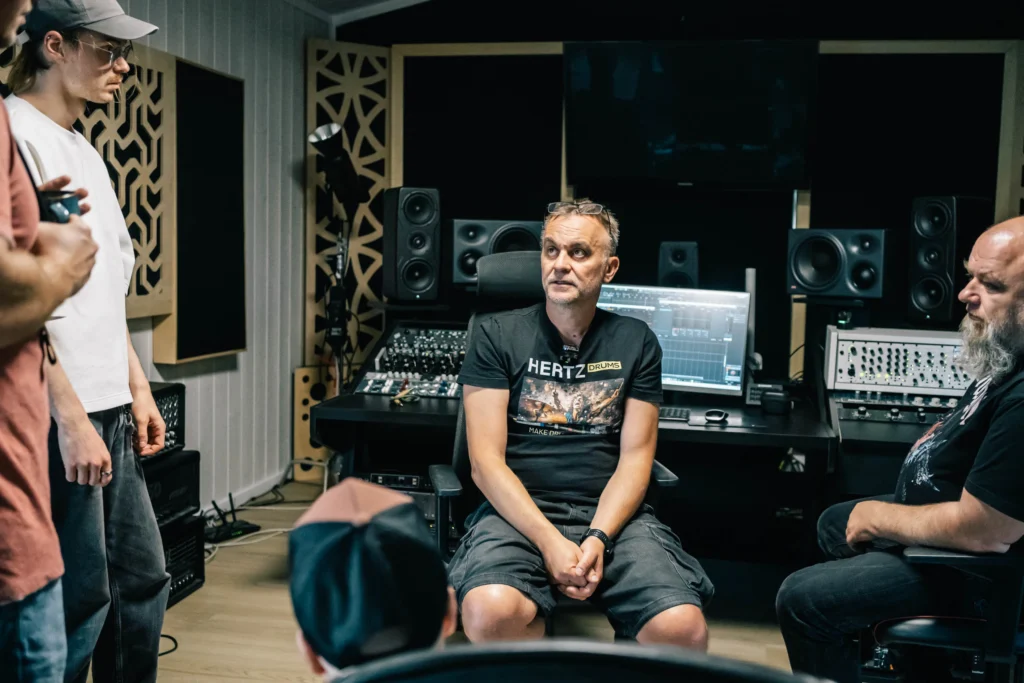 Mastering 2 Wojtek Wiesławski leading a mixing and mastering session with the band at his studio